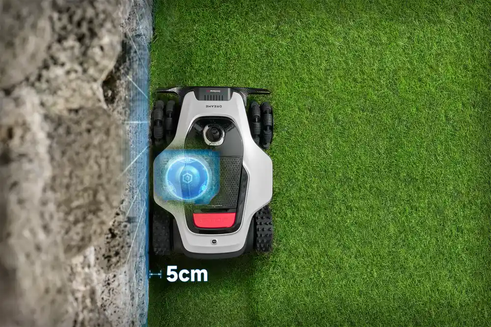 Dreame robot lawn mower sensing a stone wall edge with a 5cm precision distance marker.