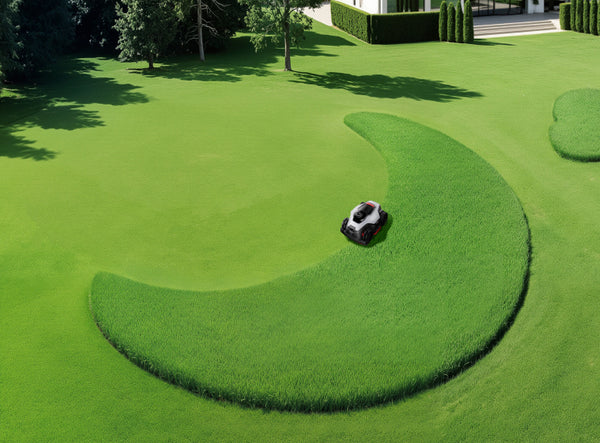 Dreame A3 AWD Pro Series creating a custom shape on a lawn using the Dreamehome app.